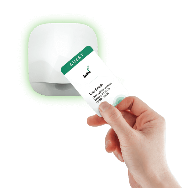 Guest tapping their work-issued card to check in for their reserved seating